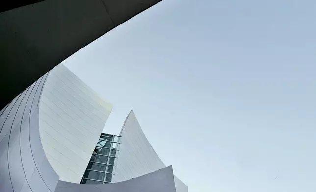 FILE - A view of the swoops of stainless-steel sheets that distinguish the new Walt Disney Concert Hall, designed by renowned architect Frank Gehry in downtown Los Angeles, Oct. 13, 2003. (AP Photo/Kevork Djansezian, File)