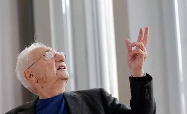 FILE - American architect Frank Gehry speaks to journalists during the press day of his latest creation, the Louis Vuitton Foundation art museum and cultural center, in Paris, Oct. 17, 2014. (AP Photo/Christophe Ena, File)