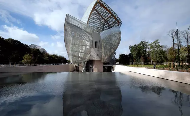 FILE - A view of the Louis Vuitton Foundation art museum and cultural center, designed by American architect Frank Gehry, in Paris, Oct. 17, 2014. (AP Photo/Christophe Ena, File)