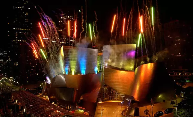 FILE - Fireworks light the Walt Disney Concert Hall designed by Frank Gehry in Los Angeles, Oct. 23, 2003. (AP Photo/Nam Y. Huh, File)