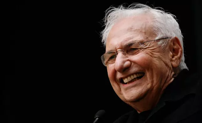 FILE - Architect Frank Gehry attends a topping-off ceremony for the Beekman tower in New York, Nov. 19, 2009. (AP Photo/Mark Lennihan, File)