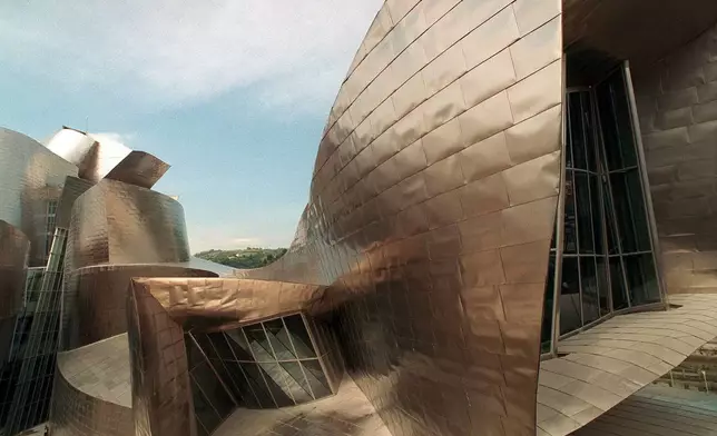 FILE - Curves and angles mix in this section of the new Guggenheim Museum designed by American architect Frank Gehry, in Bilbao, Spain, Sept. 24, 1997. (AP Photo/Javier Bauluz, File)