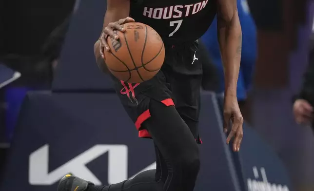 Houston Rockets forward Kevin Durant dribbles during the first half of an NBA basketball game against the Los Angeles Clippers Tuesday, Dec. 23, 2025, in Inglewood, Calif. (AP Photo/Jae C. Hong)