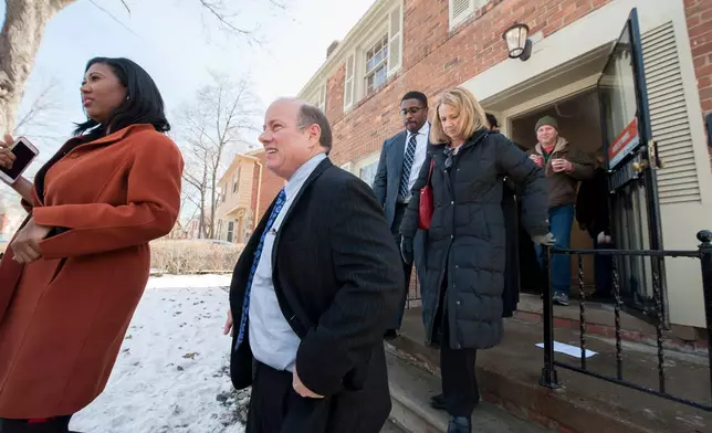 FILE - Detroit Mayor Mike Duggan comes outside after a news conference to announce a new Detroit home mortgage program in Detroit, Mich., Feb. 18, 2016. (David Guralnick/Detroit News via AP, File)