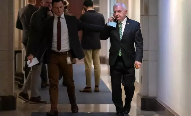 Senate Armed Services Committee ranking member Sen. Jack Reed, D-R.I., leaves after a meeting with U.S. Navy Adm. Frank M. Bradley on Capitol Hill, Thursday, Dec. 4, 2025, in Washington. (AP Photo/Mark Schiefelbein)