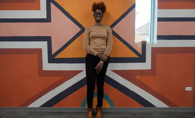 Former Minnesota Lynx forward Devereaux Peters, transitioned from basketball to real estate development, poses for a photo at her office in Chicago, Monday, Nov. 24, 2025. (AP Photo/Erin Hooley)