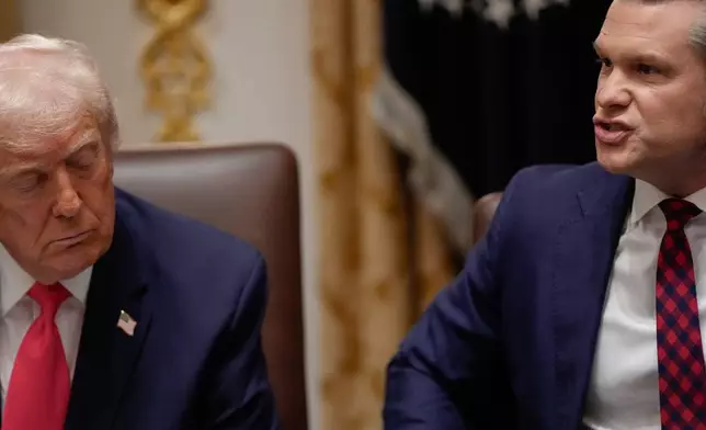 President Donald Trump closes his eyes as Defense Secretary Pete Hegseth speaks during a Cabinet meeting at the White House, Tuesday, Dec. 2, 2025, in Washington. (AP Photo/Julia Demaree Nikhinson)