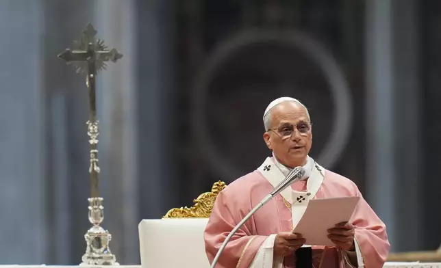 Pope Leo XIV delivers his speech as he celebrates a Mass on the occasion of the Jubilee of Prisoners in St. Peter's Basilica, at the Vatican, Sunday, Dec. 14, 2025. (AP Photo/Alessandra Tarantino)