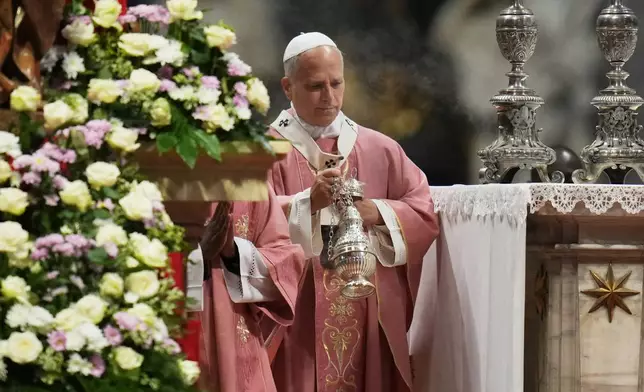 Pope Leo XIV celebrates a Mass on the occasion of the Jubilee of Prisoners in St. Peter's Basilica, at the Vatican, Sunday, Dec. 14, 2025. (AP Photo/Alessandra Tarantino)