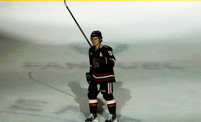 Chicago Blackhawks center Connor Bedard (98) celebrates the win against the Anaheim Ducks during an NHL hockey game, Sunday, Nov. 30, 2025, in Chicago. (AP Photo/David Banks)
