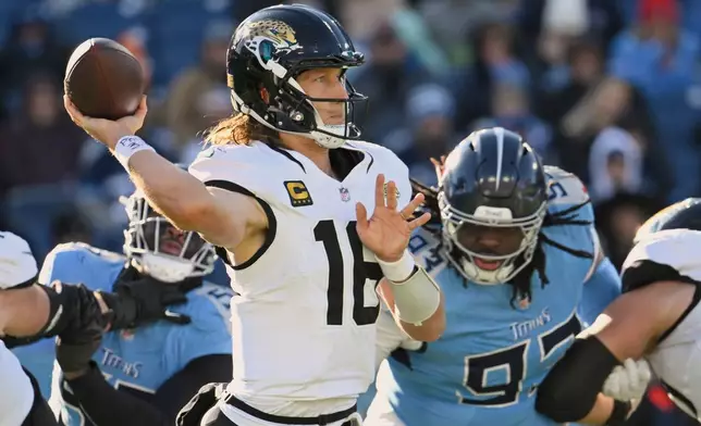 Jacksonville Jaguars quarterback Trevor Lawrence (16) throws a pass against the Tennessee Titans during the second half of an NFL football game Sunday, Nov. 30, 2025, in Nashville, Tenn. (AP Photo/John Amis)