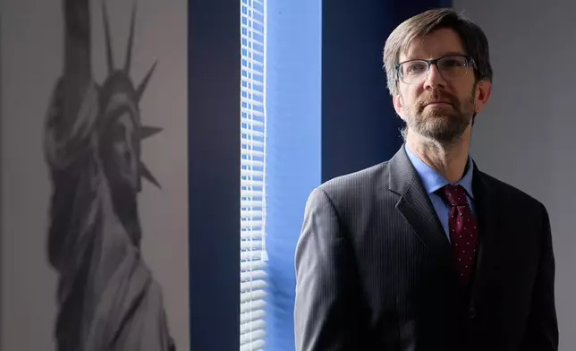 Simon Sandoval-Moshenberg, a lawyer on Kilmar Abrego Garcia's legal team who specializes in federal immigration cases, poses for a portrait in Fairfax, Va., Monday, Dec. 15, 2025. (AP Photo/Jacquelyn Martin)