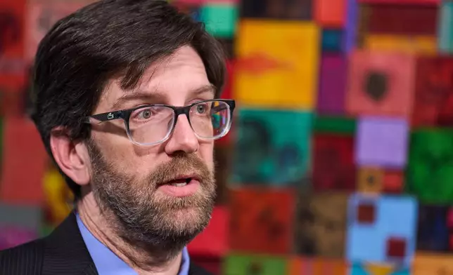 Simon Sandoval-Moshenberg, a lawyer on Kilmar Abrego Garcia's legal team who specializes in federal immigration cases, is interviewed in Fairfax, Va., Monday, Dec. 15, 2025. (AP Photo/Jacquelyn Martin)