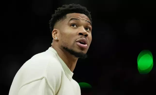 Milwaukee Bucks' Giannis Antetokounmpo looks on during the second half of an NBA basketball game against the Toronto Raptors, Thursday, Dec. 18, 2025, in Milwaukee. (AP Photo/Aaron Gash)