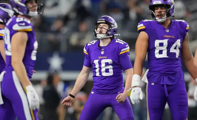 Minnesota Vikings place kicker Will Reichard (16) celebrates after making a field goal during the second half of an NFL football game against the Dallas Cowboys Sunday, Dec. 14, 2025, in Arlington, Texas. (AP Photo/Julio Cortez)