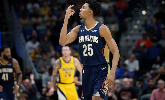 New Orleans Pelicans forward Trey Murphy III (25) reacts after making a basket against the Indiana Pacers during the first half of an NBA basketball game in New Orleans, Saturday, Dec. 20, 2025. (AP Photo/Matthew Hinton)