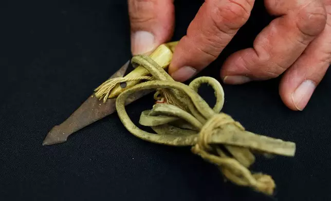 A selection of Inuit items are unveiled at the Canadian Museum of History in Gatineau, Que., on Tuesday, Dec. 9, 2025. (Sean Kilpatrick /The Canadian Press via AP)