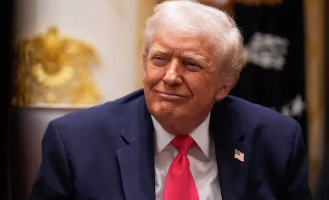President Donald Trump listens during a Cabinet meeting at the White House, Tuesday, Dec. 2, 2025, in Washington. (AP Photo/Julia Demaree Nikhinson)