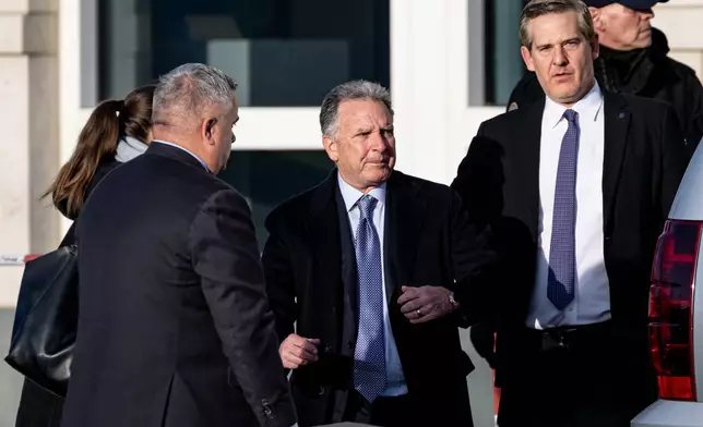 Steve Witkoff, Special Envoy of the United States, center, exits from the American Embassy in Berlin, Monday Dec. 15, 2025. (Fabian Sommer/dpa via AP)