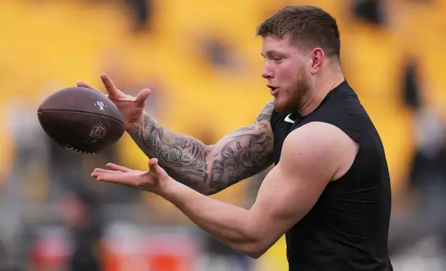 Pittsburgh Steelers linebacker Jack Sawyer warms up before an NFL football game against the Buffalo Bills Sunday, Nov. 30, 2025, in Pittsburgh. (AP Photo/Gene J. Puskar)