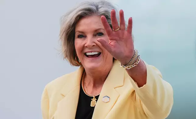 FILE - White House Chief of Staff Susie Wiles waves after disembarking Air Force One, June 25, 2025, at Joint Base Andrews, Md. (AP Photo/Julia Demaree Nikhinson, File)
