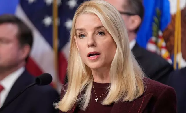 FILE - Attorney General Pam Bondi speaks with reporters during a news conference at the Department of Justice, Nov. 19, 2025, in Washington. (AP Photo/Mark Schiefelbein, File)