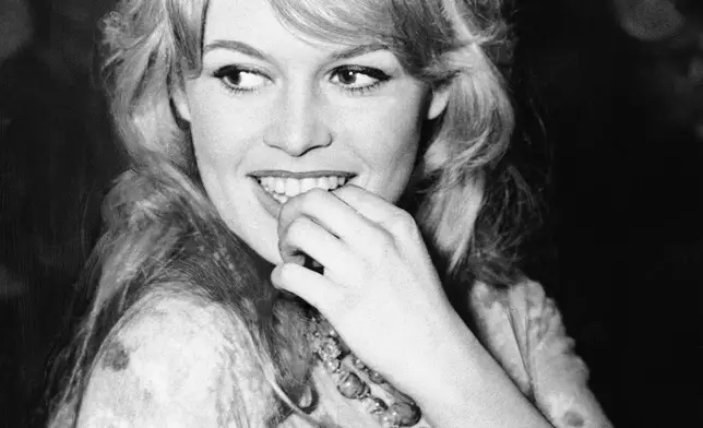 FILE - French film actress Brigitte Bardot appears at the Mount Royal Hotel in London on April 9, 1959. (AP Photo/Dave Dawson, File)