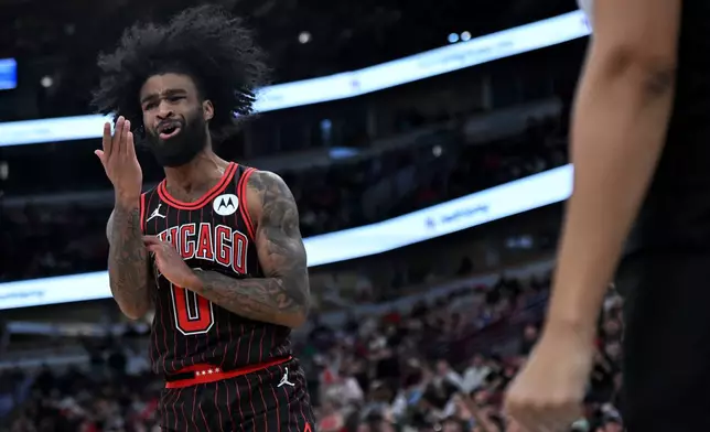 Chicago Bulls' Coby White yells at a referee during the second half of an NBA basketball game against the New Orleans Pelicans, Sunday, Dec. 14, 2025, in Chicago. (AP Photo/Paul Beaty)