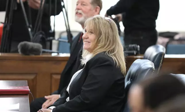 Former Colleton County Clerk of Court Mary Rebecca "Becky" Hill awaits a court hearing on Monday, Dec. 8, 2025, in St. Matthews, S.C. (AP Photo/Jeffrey Collins)
