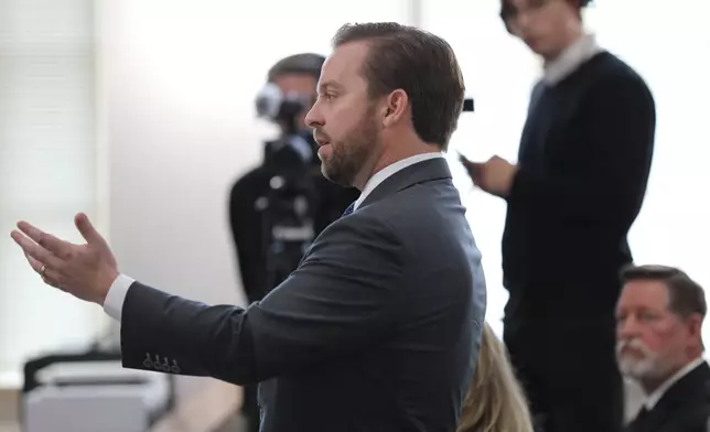 Attorney Will Lewis speaks on behalf of his client former Colleton County Clerk of Court Mary Rebecca "Becky" Hill as she pleads guilty on Monday, Dec. 8, 2025, in St. Matthews, S.C.. (AP Photo/Jeffrey Collins)