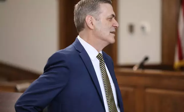Solicitor Rick Hubbard waits for a court hearing where former Colleton County Clerk of Court Mary Rebecca "Becky" Hill pleaded guilty on Monday, Dec. 8, 2025, in St. Matthews, S.C.. (AP Photo/Jeffrey Collins)