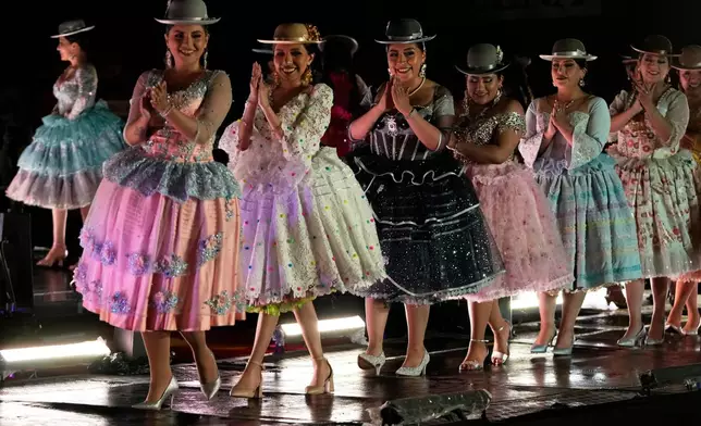 FILE - Models wear creations during a fashion show by local designers in La Paz, Bolivia, Oct. 24, 2025. (AP Photo/Juan Karita, File)