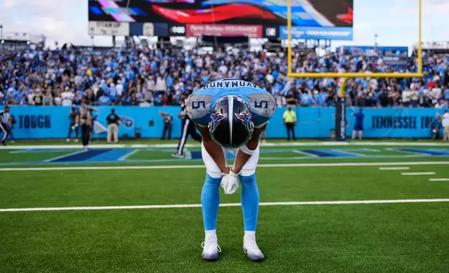 Tennessee Titans wide receiver Elic Ayomanor (5) reacts after losing to the New Orleans Saints in an NFL football game, Sunday, Dec. 28, 2025, in Nashville, Tenn. (AP Photo/George Walker IV)