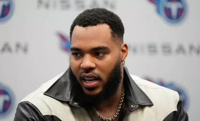 Tennessee Titans defensive tackle Jeffery Simmons talks to reporters after an NFL football game against the New Orleans Saints, Sunday, Dec. 28, 2025, in Nashville, Tenn. (AP Photo/George Walker IV)