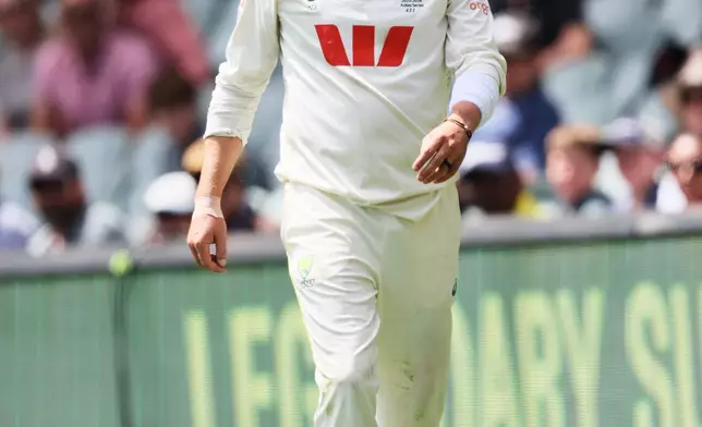 Australia's Nathan Lyon walks from the field during play on the final day of the third Ashes cricket test between England and Australia in Adelaide, Australia, Sunday, Dec. 21, 2025. (AP Photo/James Elsby)