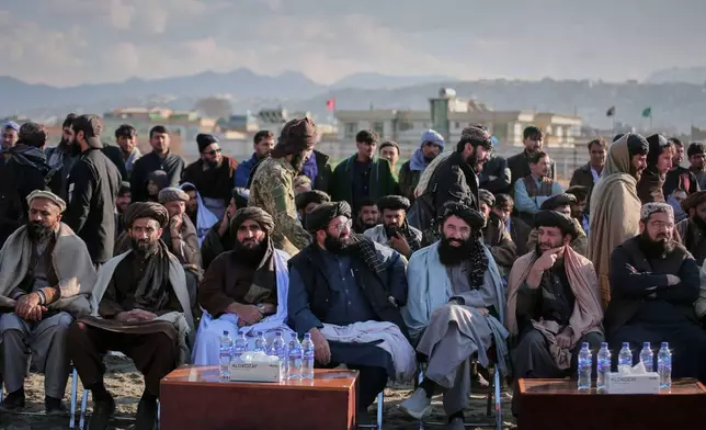 Taliban authorities attend the final match of Afghanistan's annual buzkashi tournament, a traditional equestrian sport in which riders compete to score points using a fake goat carcass, on the outskirts of Kabul, Afghanistan, Monday, Dec. 22, 2025. (AP Photo)