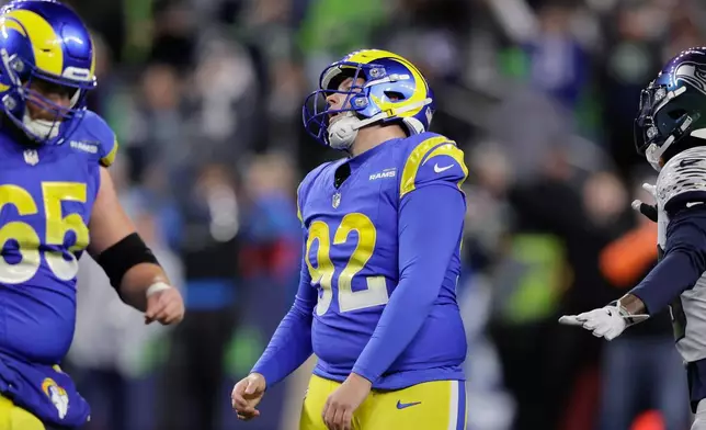 Los Angeles Rams place-kicker Harrison Mevis (92) watches his failed field goal attempt during the second half of an NFL football game against the Seattle Seahawks, Thursday, Dec. 18, 2025, in Seattle. (AP Photo/John Froschauer)