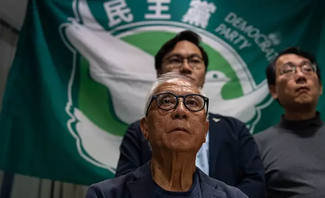 Yeung Sum, committee member of Hong Kong's Democratic Party, at a press conference at the office of Hong Kong's Democratic Party in Hong Kong on Sunday, Dec. 14, 2025. (AP Photo/Chan Long Hei)