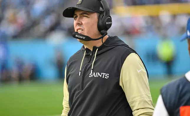New Orleans Saints head coach Kellen Moore reacts on the sideline in the second half of an NFL football game against the Tennessee Titans, Sunday, Dec. 28, 2025, in Nashville, Tenn. (AP Photo/John Amis)