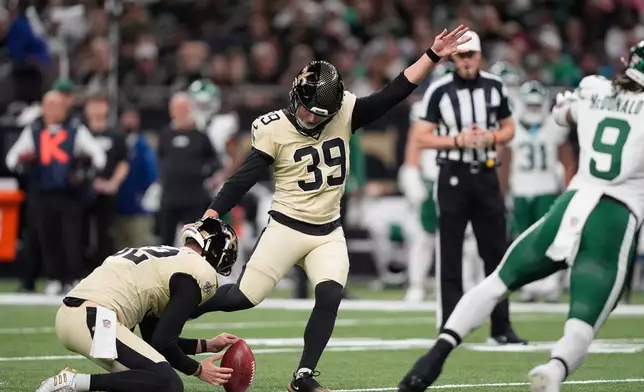 New Orleans Saints kicker Charlie Smyth (39) kicks a field goal during the first half of an NFL football game against the New York Jets, Sunday, Dec. 21, 2025, in New Orleans. (AP Photo/Gerald Herbert)