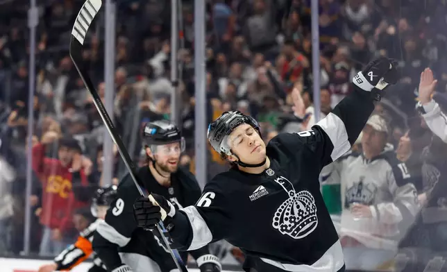 Los Angeles Kings left wing Andrei Kuzmenko (96) reacts after scoring during the second period of an NHL hockey game, Saturday, Dec. 6, 2025, in Los Angeles. (AP Photo/Caroline Brehman)