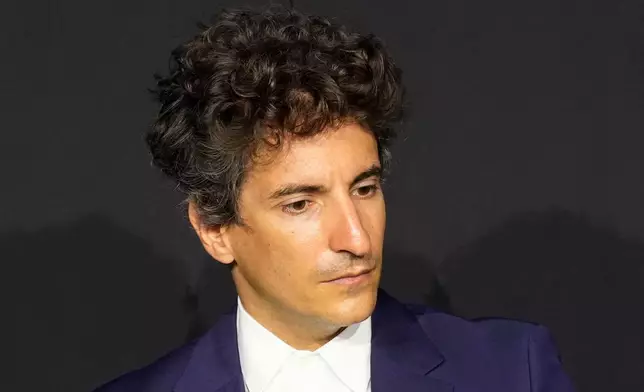 FILE- Prada Group Chief Marketing Officer Lorenzo Bertelli attends the presentation of the Axiom and Prada-designed spacesuit that will be used by NASA from 2026, in Milan, Italy, Wednesday, Oct. 16, 2024. (AP Photo/Antonio Calanni, File)