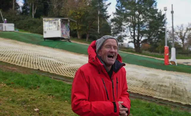 British former ski jumper Michael Edwards, known as Eddie the Eagle, speaks during an interview at the Ski and Snowboard Center in Gloucester, England, Wednesday, Nov. 19, 2025. (AP Photo/Frank Augstein)
