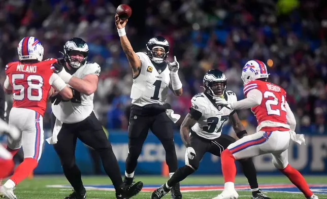 Philadelphia Eagles' Jalen Hurts passes during the first half of an NFL football game against the Buffalo Bills, Sunday, Dec. 28, 2025, in Buffalo, N.Y. (AP Photo/Adrian Kraus)