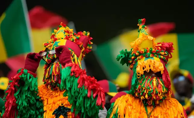 Senegal's fans cheer before the Africa Cup of Nations group D soccer match between Senegal and Botswana in Tangier, Morocco, Tuesday, Dec. 23, 2025. (AP Photo/Mosa'ab Elshamy)
