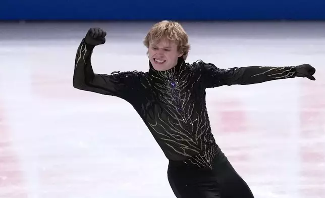 Ilia Malinin, of the United States, competes in the men's free skating segment at the ISU Grand Prix of Figure Skating Final in Nagoya, central Japan, Saturday, Dec. 6, 2025. (AP Photo/Hiro Komae)