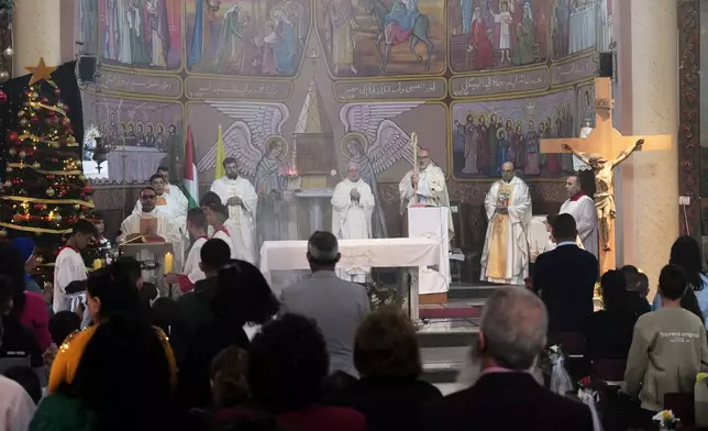 Cardinal Pierbattista Pizzaballa, the Latin Patriarch of Jerusalem, leads a Christmas Eve Mass at the Holy Family Catholic Church in Gaza City, Sunday, Dec. 21, 2025. (AP Photo/Jehad Alshrafi)