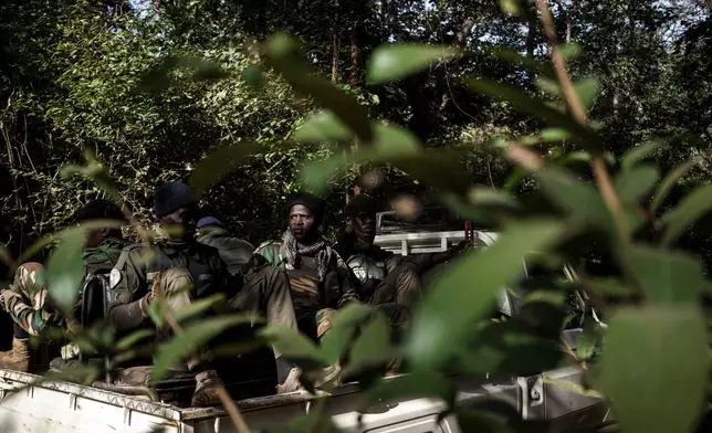 Members of the Lion Intervention Brigade conduct a patrol Jan. 14, 2025, at Niokolo Koba National Park, Senegal. (AP Photo/Annika Hammerschlag, File)