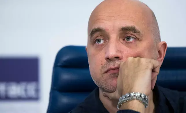 FILE - Russian writer Zakhar Prilepin attends a news conference in Moscow, Russia, on Feb. 21, 2017. (AP Photo/Alexander Zemlianichenko, File)