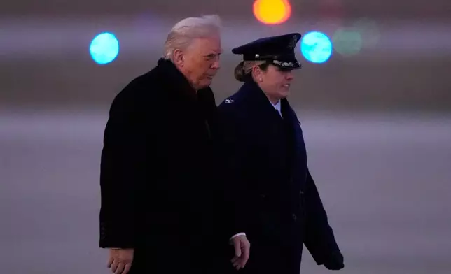 President Donald Trump exits Marine One, Tuesday, Dec. 9, 2025, at Joint Base Andrews, Md., for a trip to Pennsylvania. (AP Photo/Mark Schiefelbein)